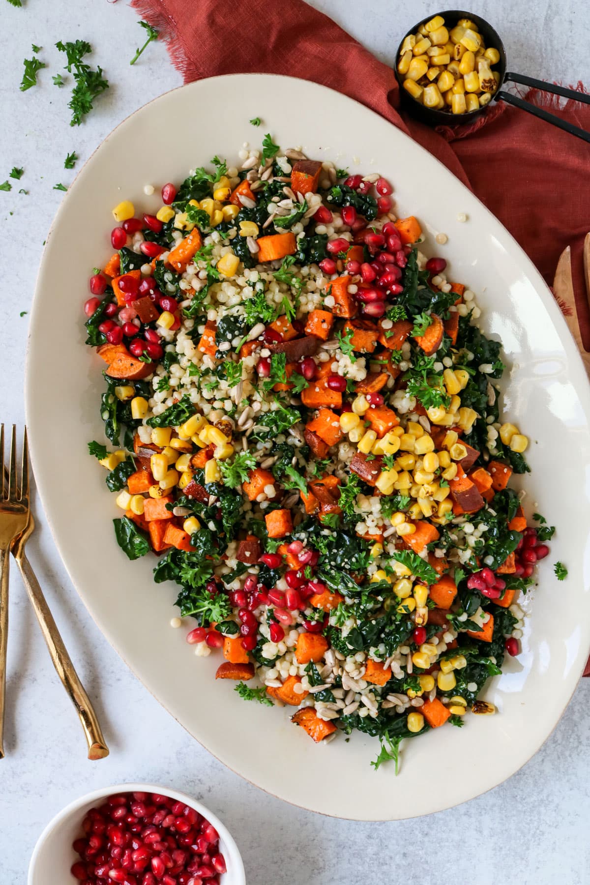 couscous salad with kale, sweet potato and pomegranate