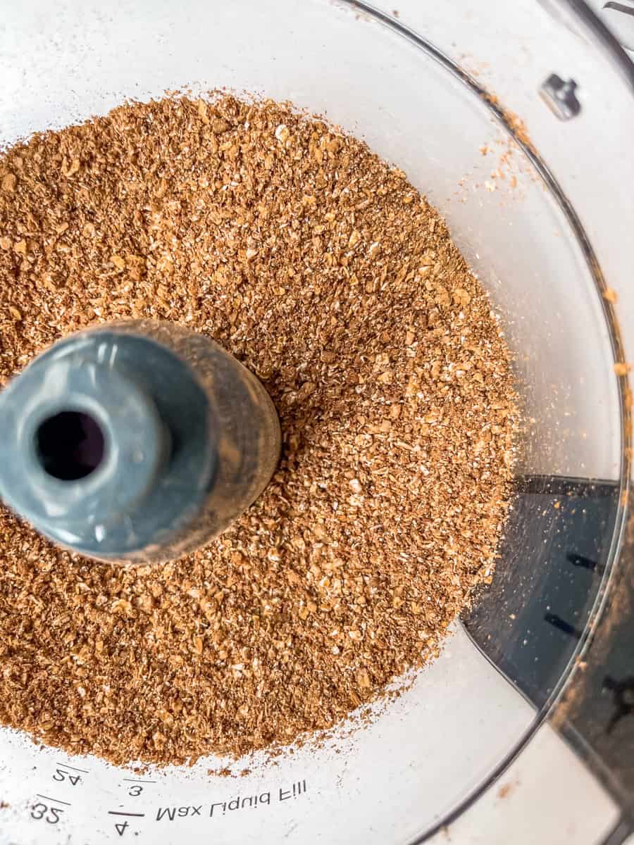 Pulsed dry ingredients in the bowl of a food processor. 